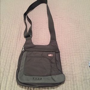 Tumi cross body bag - perfect condition.