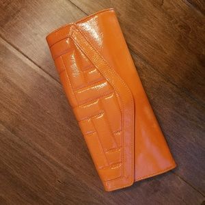 Hobo authentic orange patent leather clutch