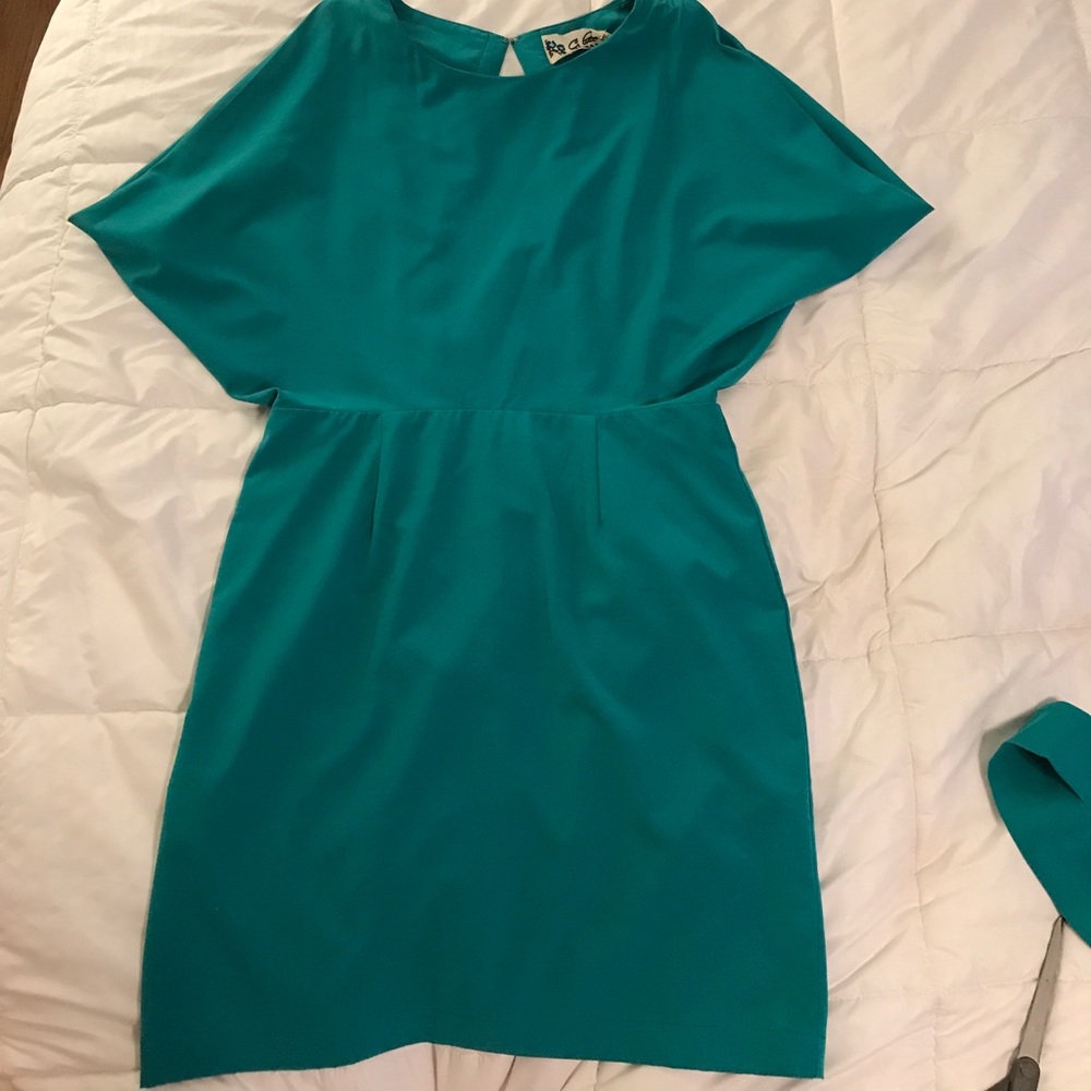 C. Luce green dress