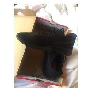 All Black Nike Tanjun