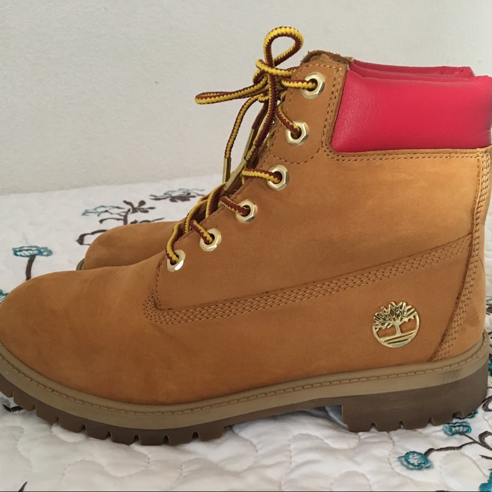 Tan Timberlands with red trim! Size 7.5 Fits 7.5-8