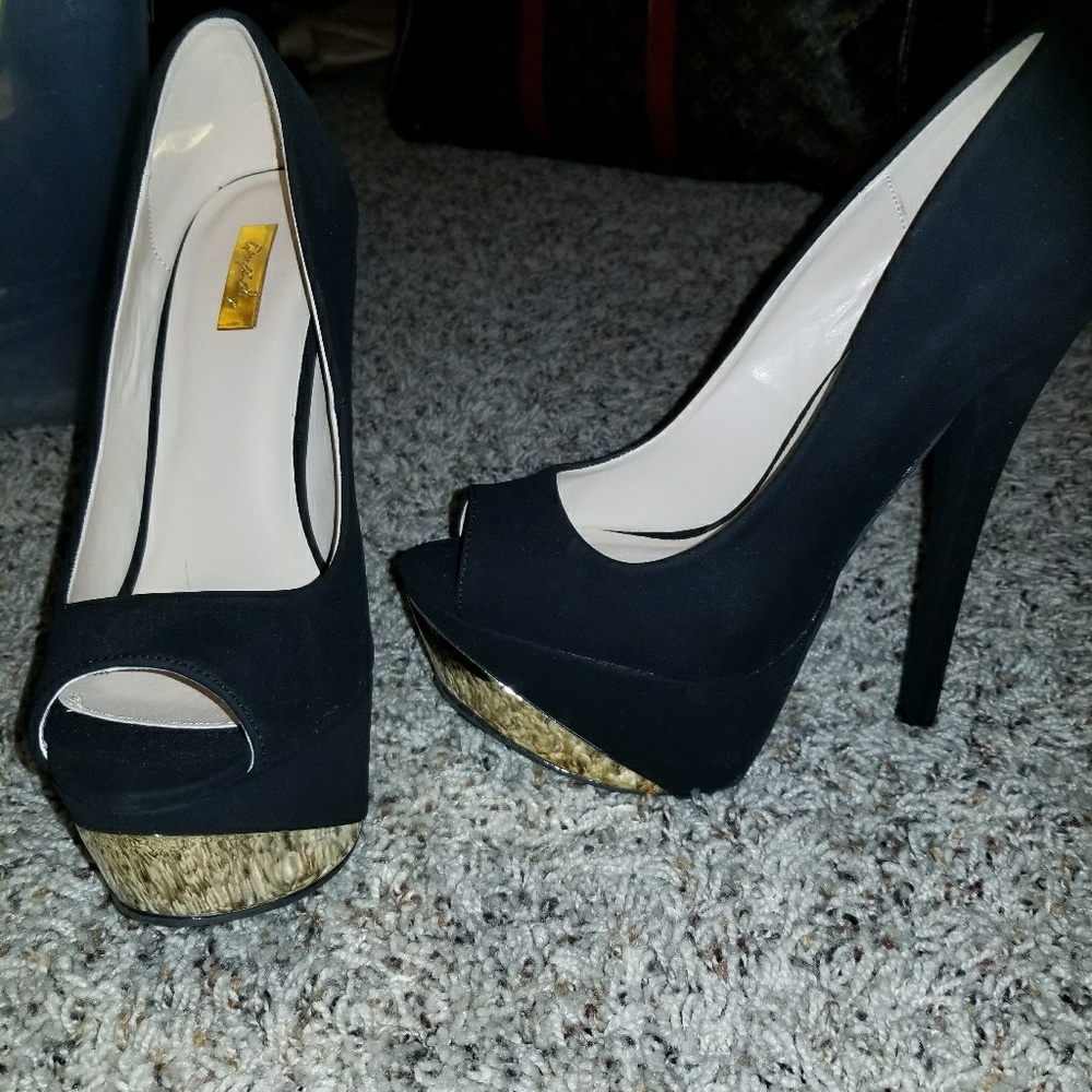 Black and gold platforms