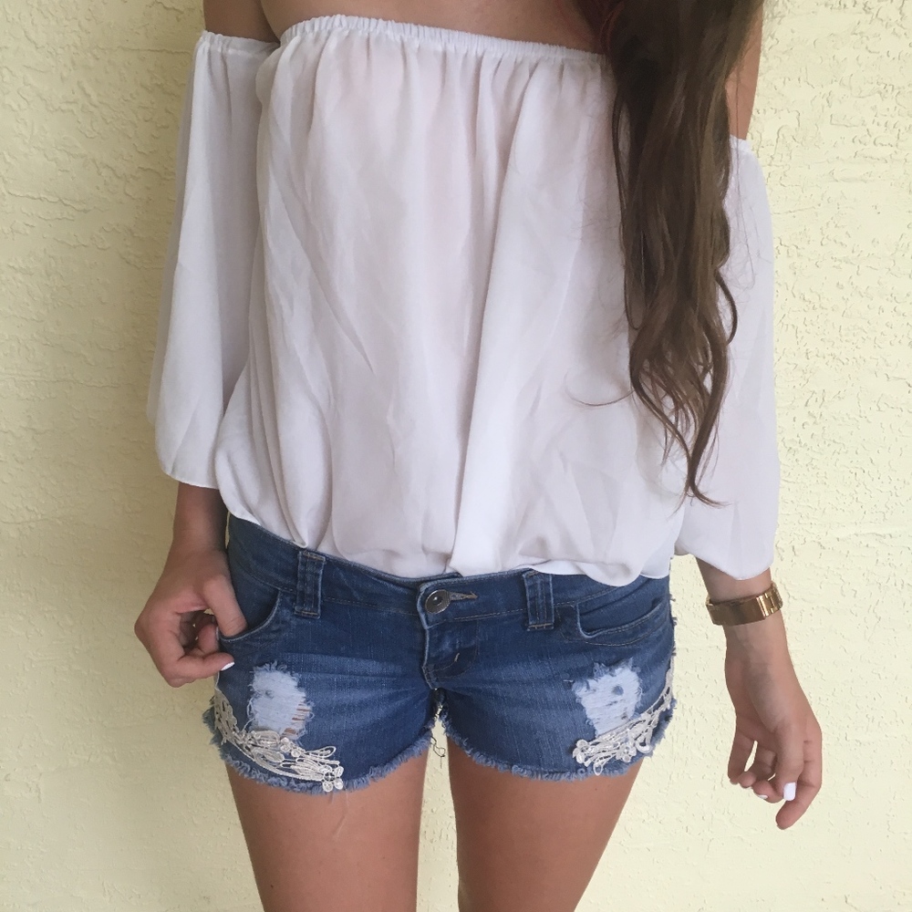 Distressed lace jean shorts