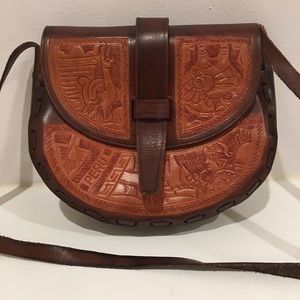 Vintage leather shoulder bag with engraving
