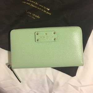 Brand new Kate Spade wallet with dust bag