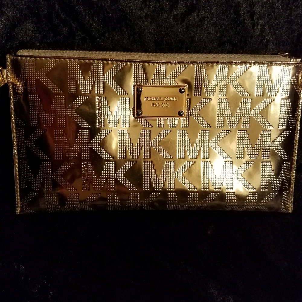 Authentic Michael Kors Rose Gold Leather Wristlet