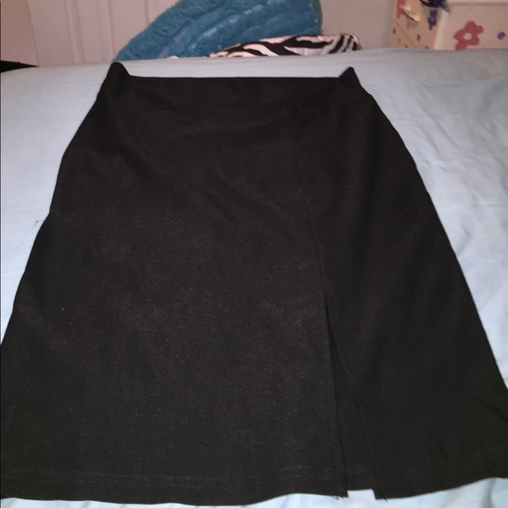 Black Skirt with split in the front.