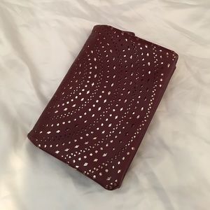 Plum clutch/shoulder bag.