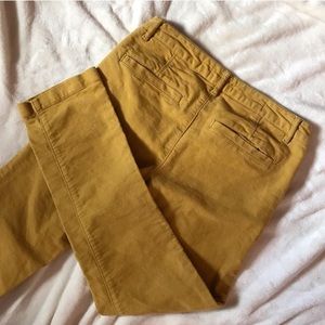 Anthropologie mustard chinos