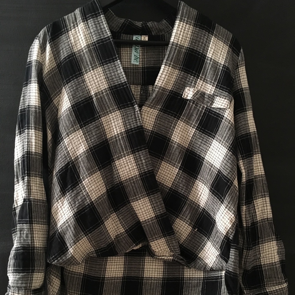 Gray and white flannel with a clip and frocket