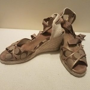 Coach wedge shoes with lace straps.
