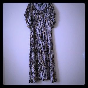 Dress with peek a boo shoulders