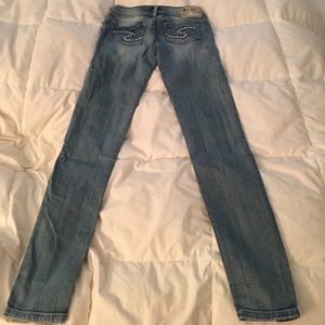 Silver skinny jeans! Size 25!