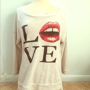 Sweatshirt with slits in back