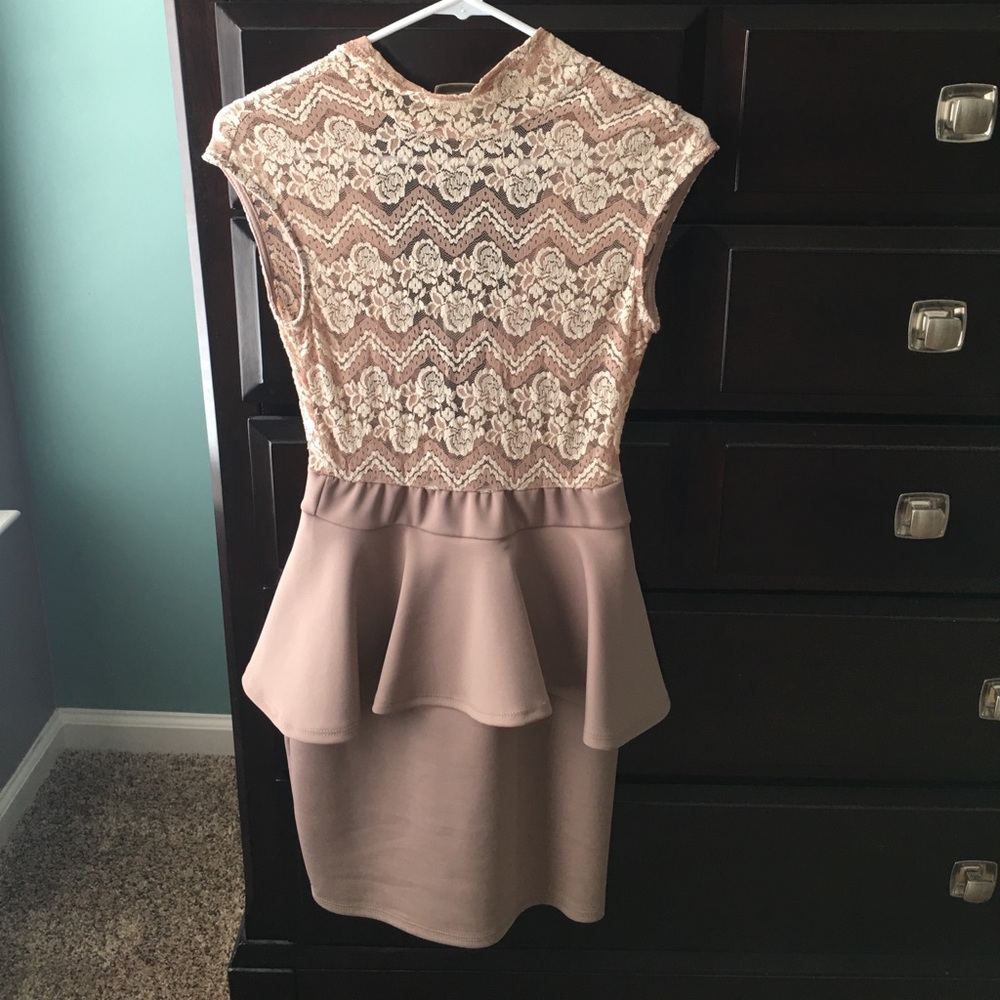 Nude peplum dress