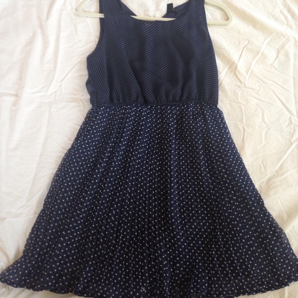 Navy blue dress with polka dots all over