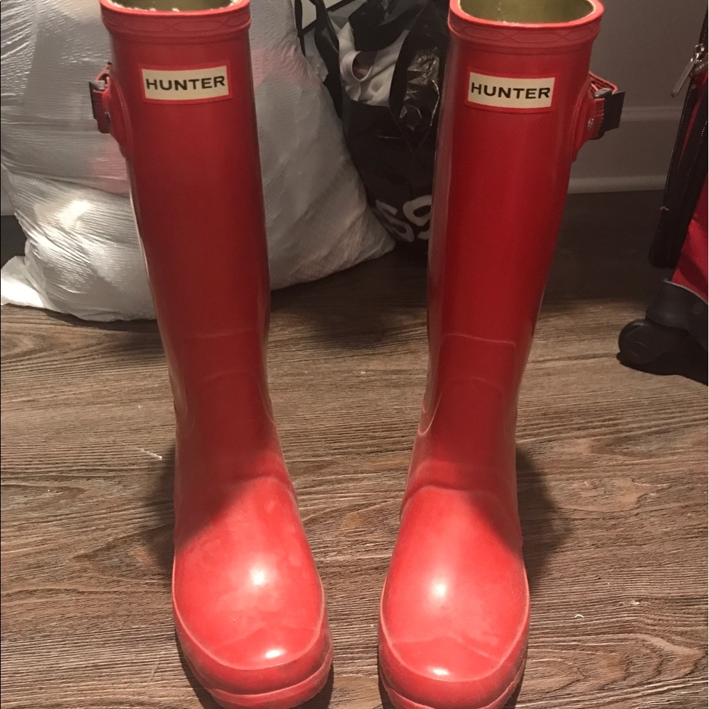 Red tall Hunter rain boots