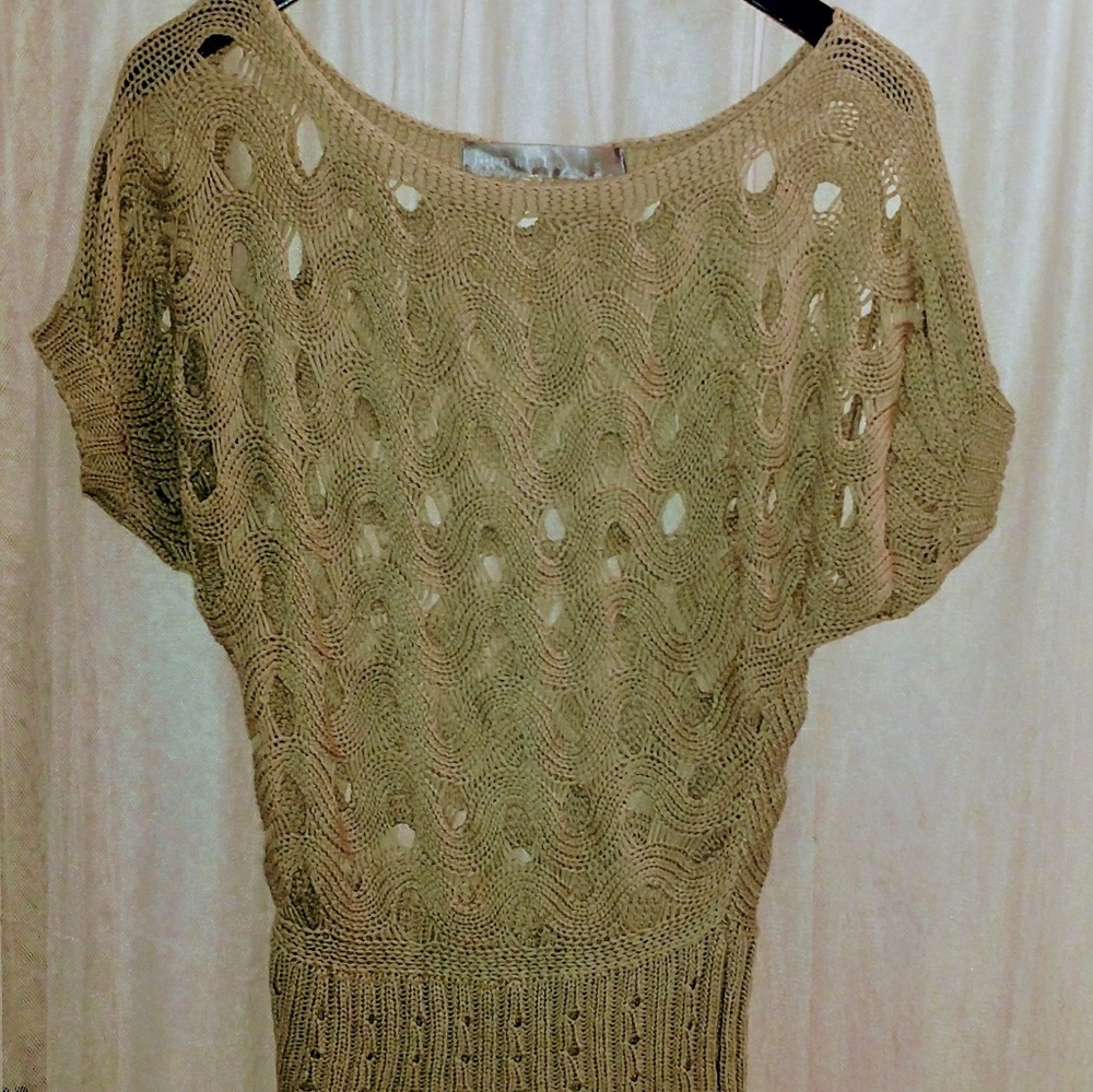 Knit hole sweater
