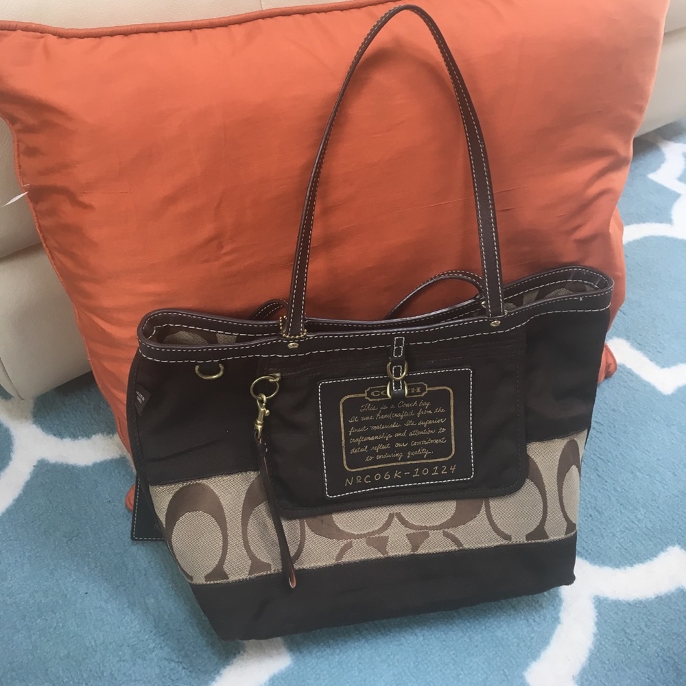 A vintage reversible canvas Coach tote