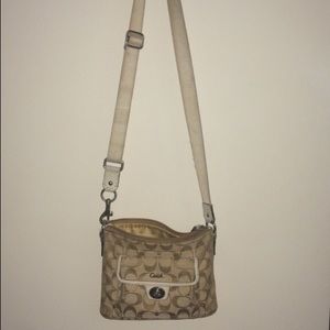Tan Coach cross body purse