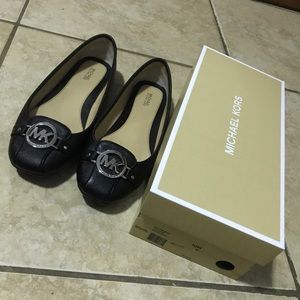 MK black flats