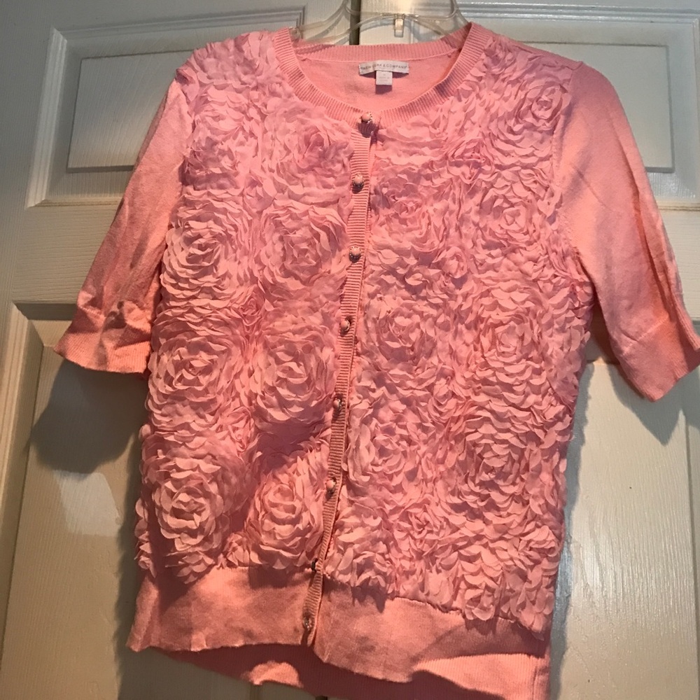 Pink sweater with roses on the front