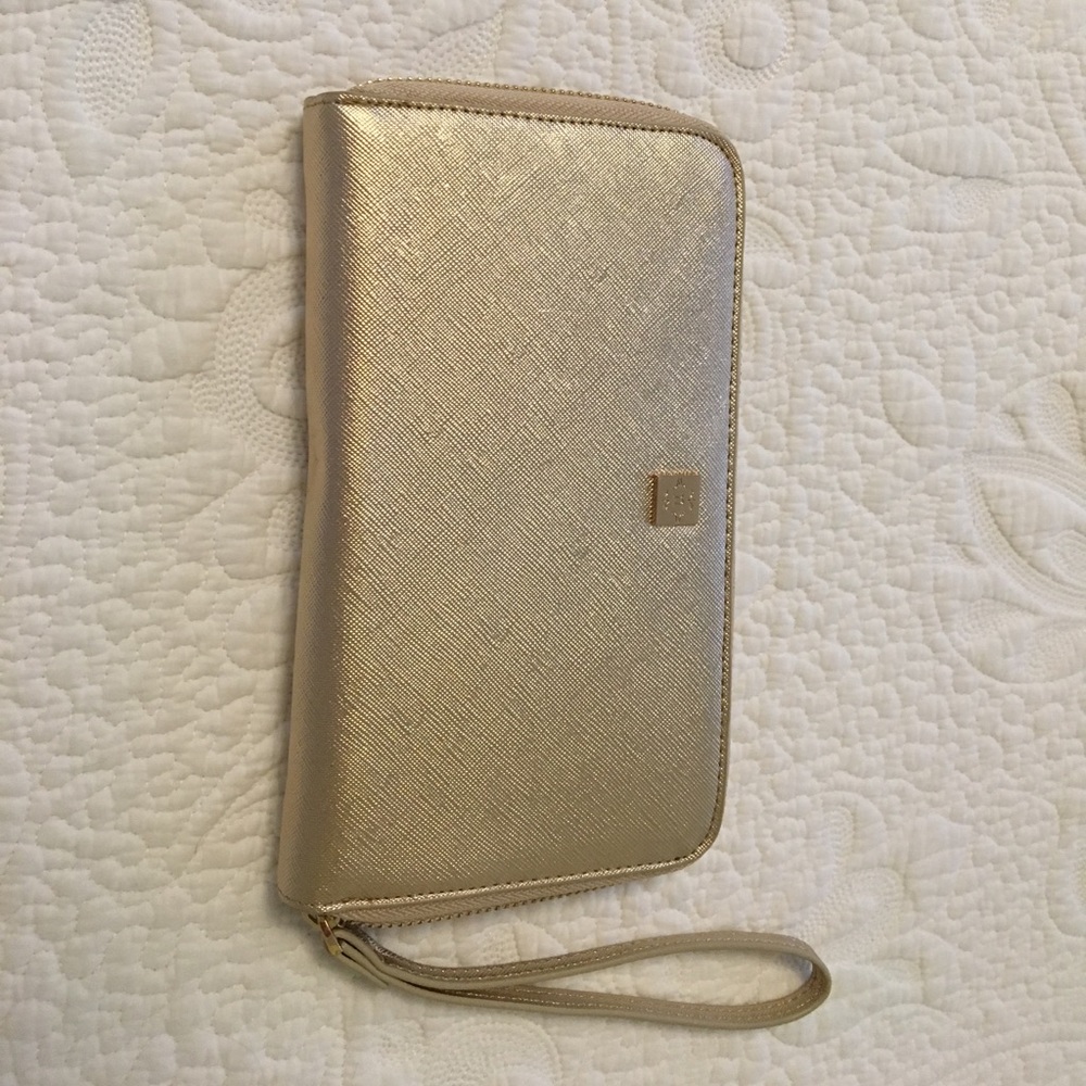 Nicole Miller gold wristlet NWOT