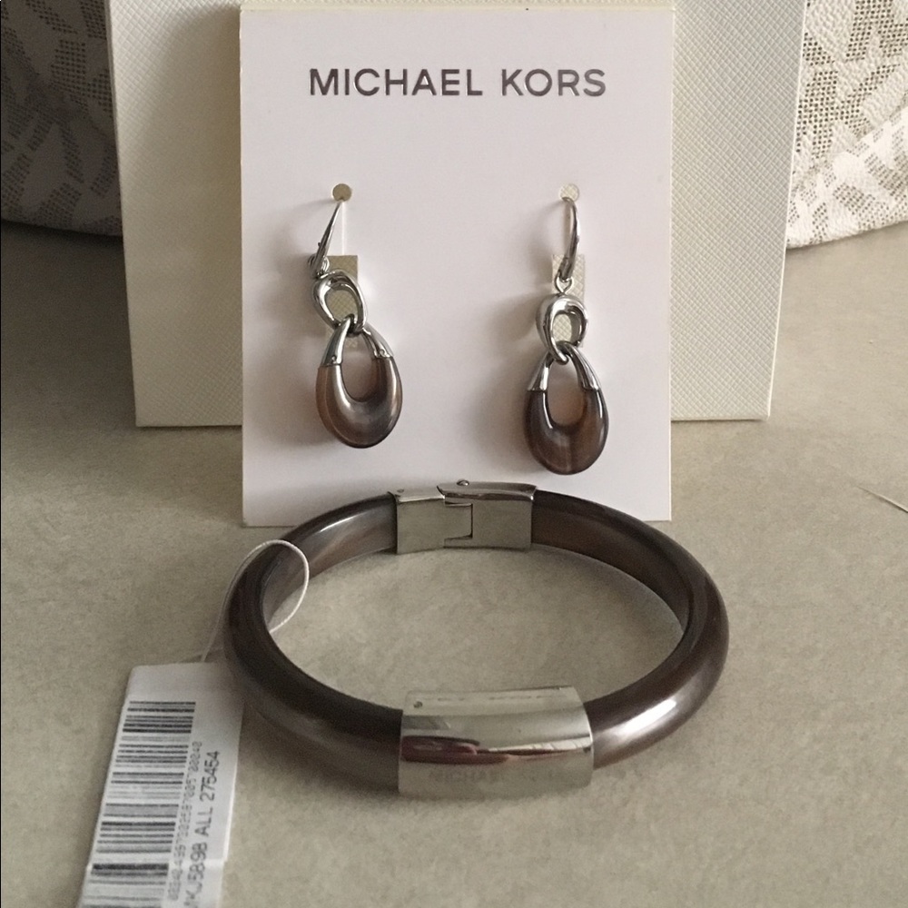 Michael kors matching bracelet and earring set.