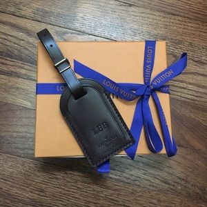 Authentic Louis Vuitton luggage tag.