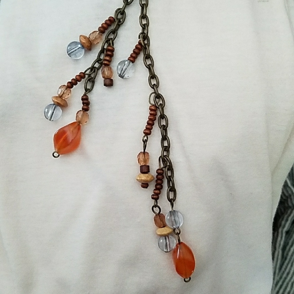 Beaded necklace on a dark metal chain