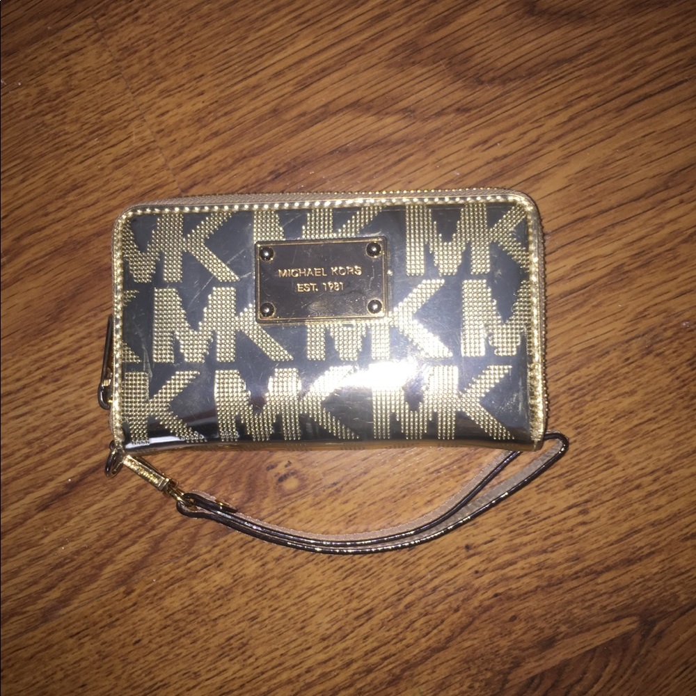 Michael Kors gold wristlet