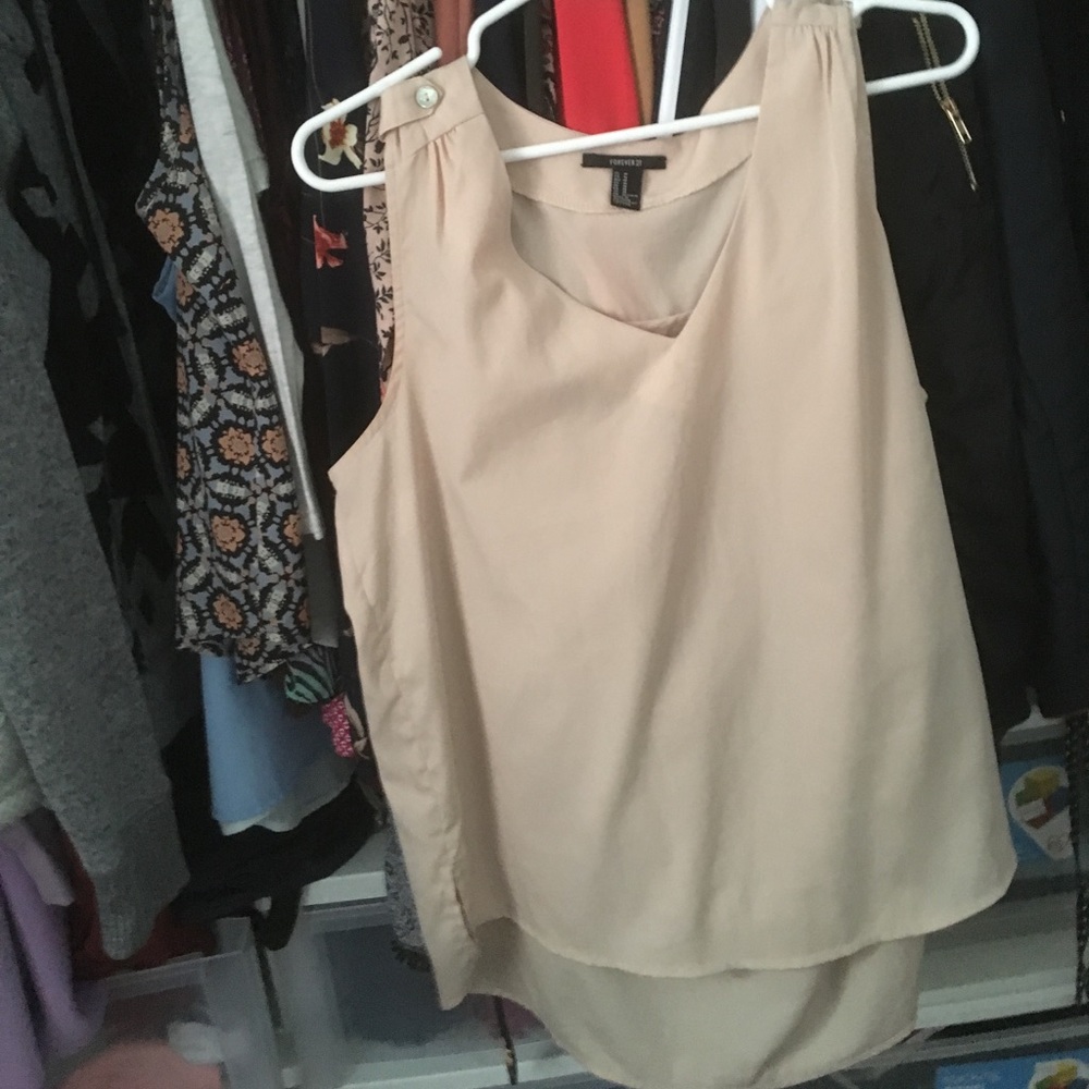 tan color blouse