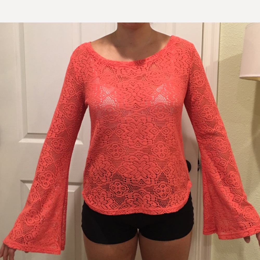 Two lace tops with bell sleeves