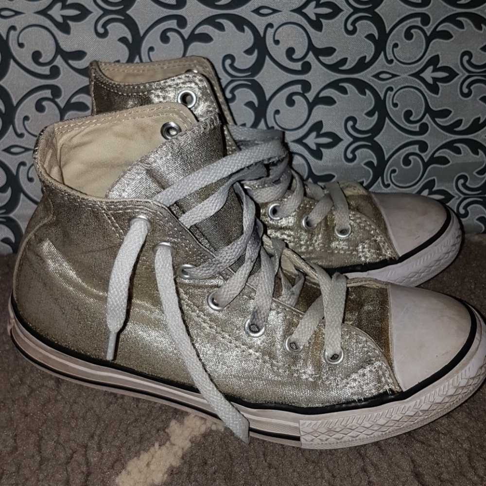 Gold high top Converse Chuck Taylors