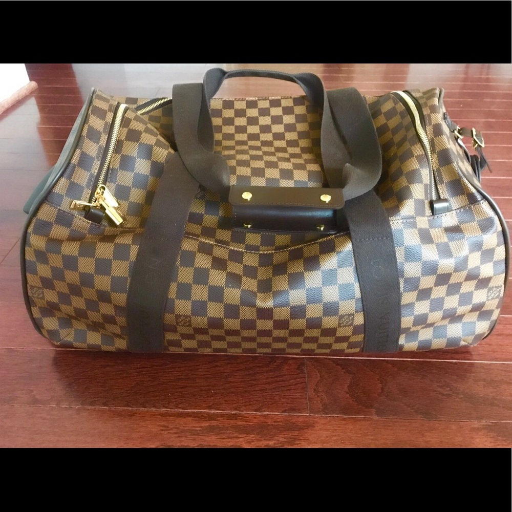 Louis Vuitton traveling luggage carry on on wheels