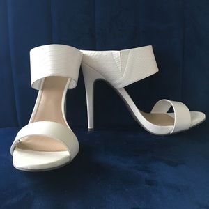 White heeled sandals