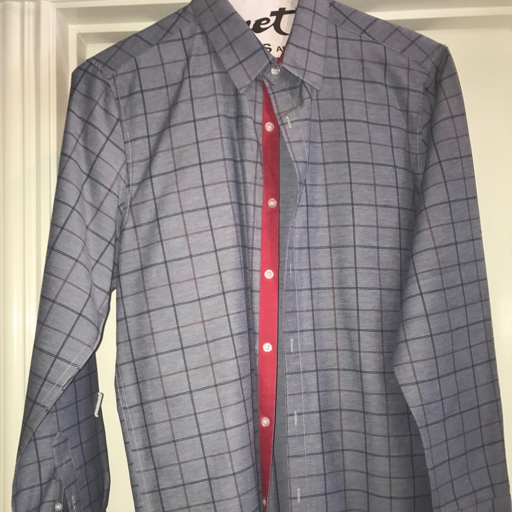 Men's button up shirt. Only pressed. Never worn.