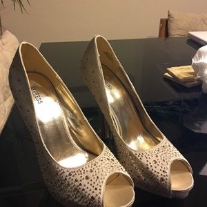 Express. Glam gold heels size 10.