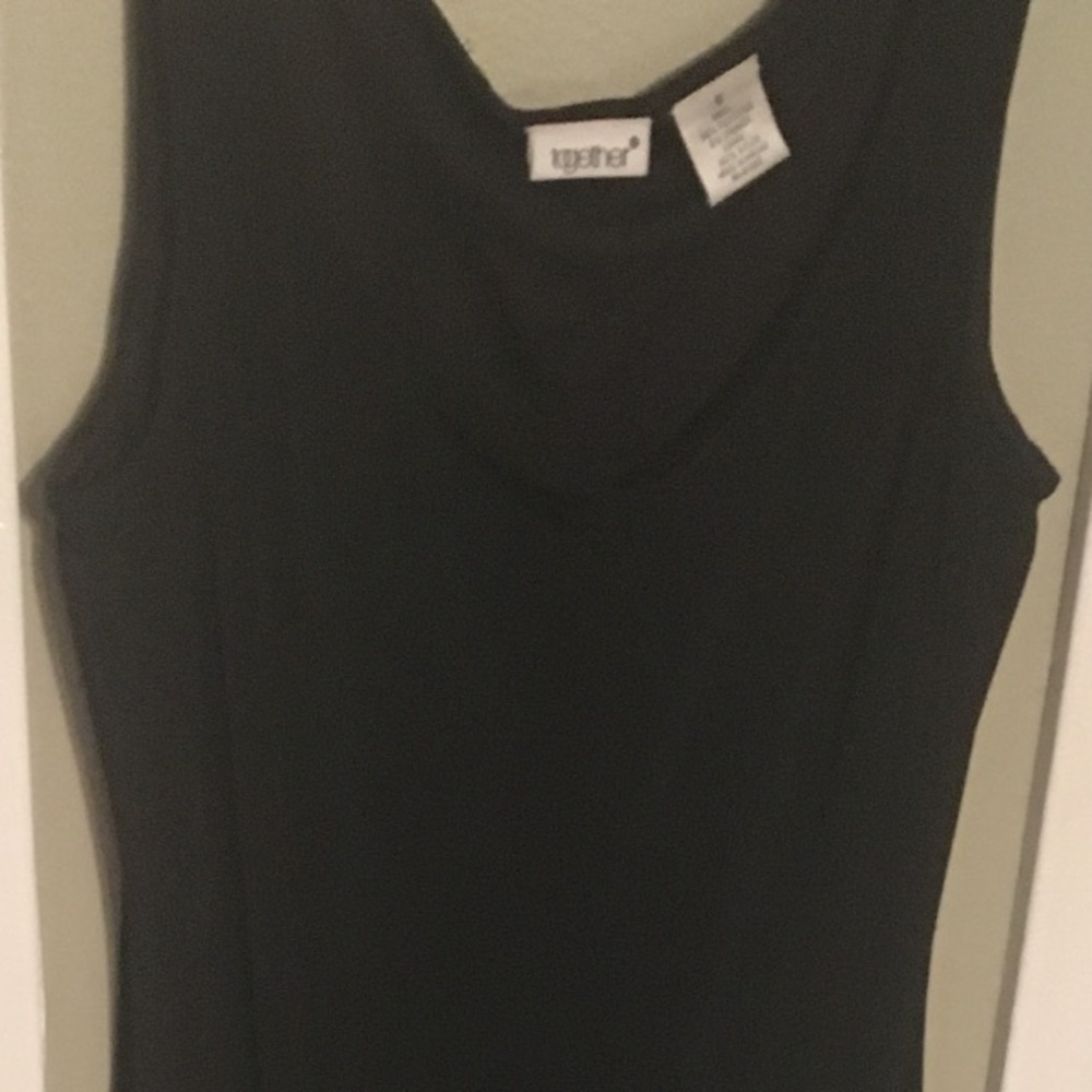 Fringe dress with lining. 94% polyester 6% spandex