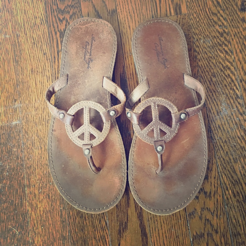 American Eagle peace sign flip flops
