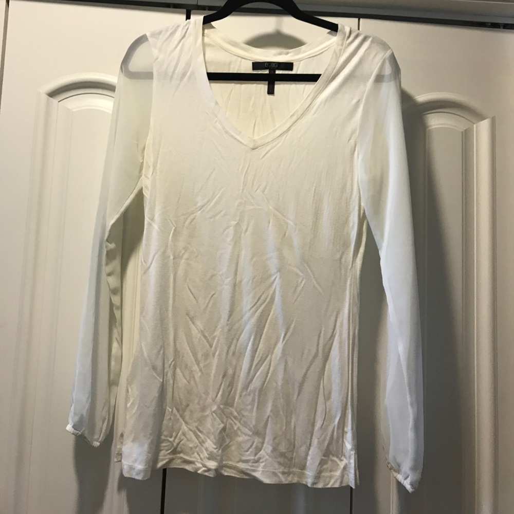 BCBG cream sheer long sleeve top.