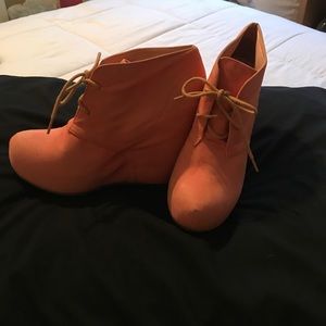 Cute peach colored wedged booties
