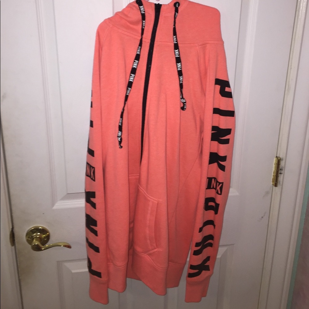 Orange coral colored zip up hoodie from Pink