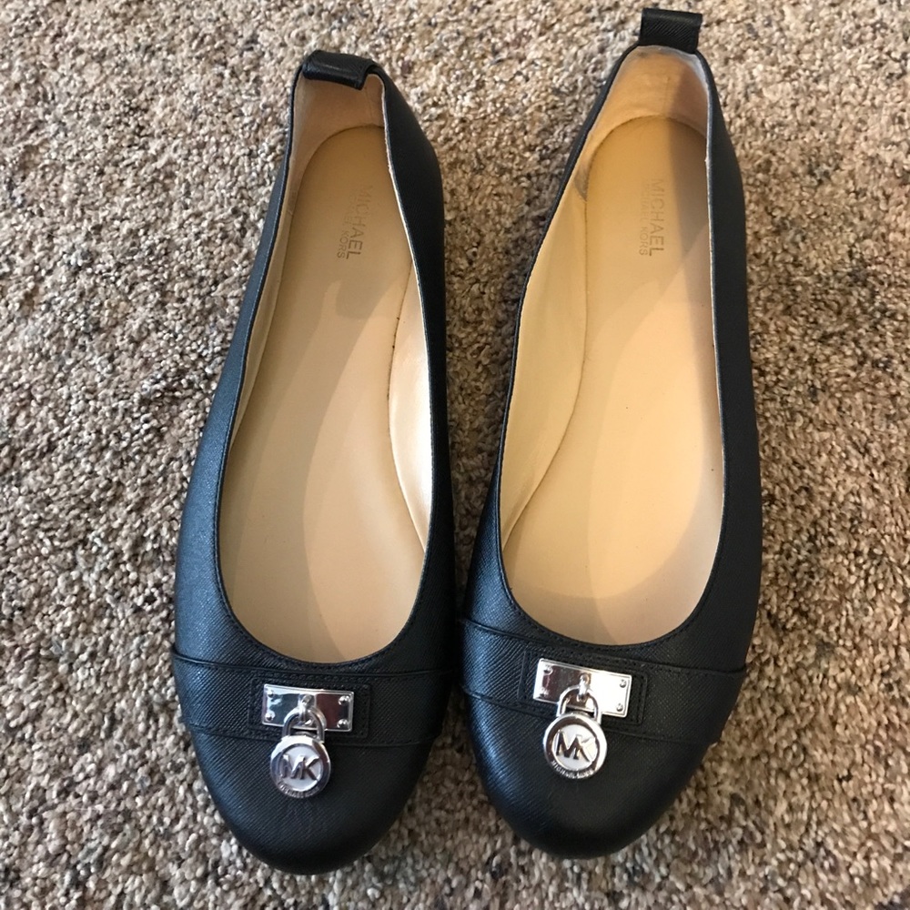 Michael Kors ballet flats.