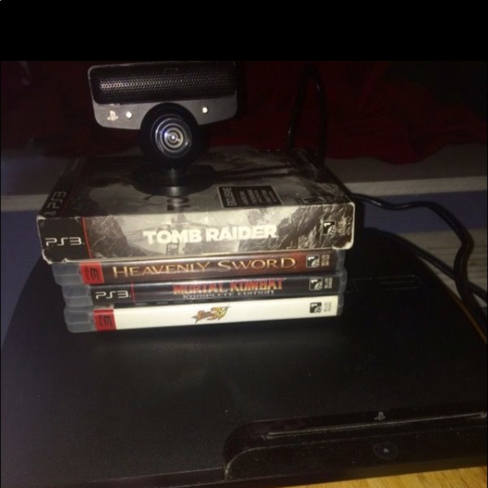 PS3 system and camera with vids games