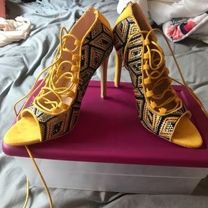 Yellow colored high heels