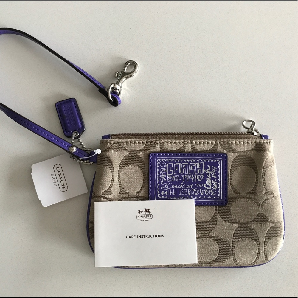 Coach khaki/violet wristlet brand new with tags.