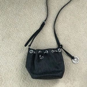 Authentic Michael Kors small shoulder bag.