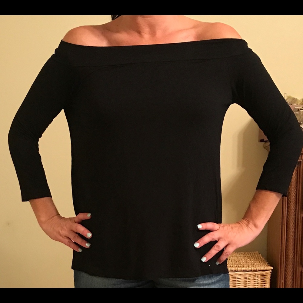 Michael stars over the shoulder top