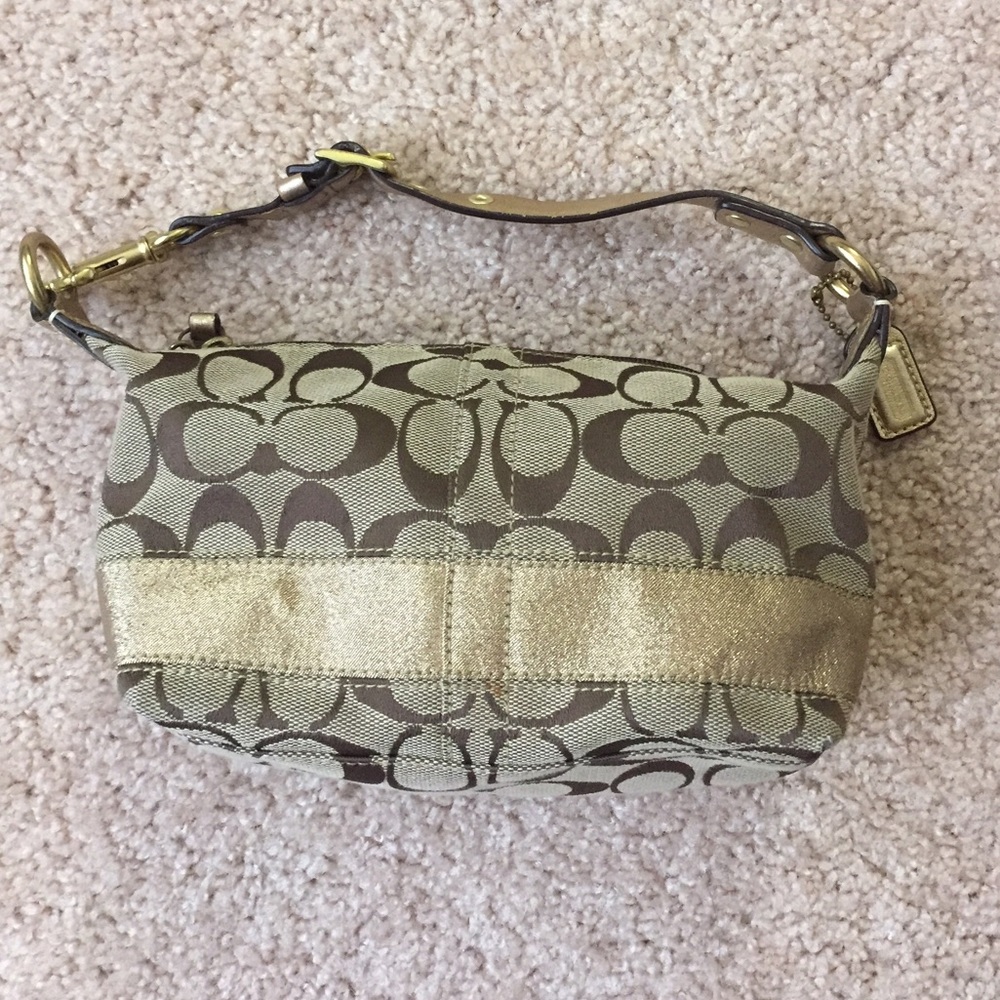 Small coach clutch bag